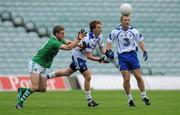 16 July 2011; Cillian O'Keeffe, Waterford, in action against Eoin Hogan, Limerick. GAA Football All-Ireland Senior Championship Qualifier, Round 3, Limerick v Waterford, Gaelic Grounds, Limerick. Picture credit: Diarmuid Greene / SPORTSFILE