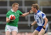 16 July 2011; Mike Sheehan, Limerick, in action against Conor Phelan, Waterford. GAA Football All-Ireland Senior Championship Qualifier, Round 3, Limerick v Waterford, Gaelic Grounds, Limerick. Picture credit: Diarmuid Greene / SPORTSFILE