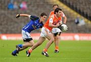 17 July 2011; Michael McKenna, Armagh, in action against Gerard Smith, Cavan. Ulster GAA Football Minor Championship Final, Armagh v Cavan, St Tiernach's Park, Clones, Co. Monaghan. Picture credit: Oliver McVeigh / SPORTSFILE