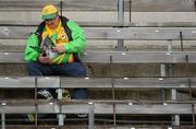 17 July 2011; A Donegal fan studies the programme ahead of the Ulster GAA Football Senior Championship Final. St Tiernach's Park, Clones, Co. Monaghan. Picture credit: Brian Lawless / SPORTSFILE