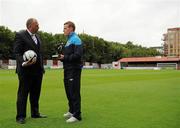 18 July 2011; St Patricks Athletic's Danny North speaking with Jason Cooke, Head of Communications with Airtricity, after being presented with the Airtricity / SWAI Player of the Month Award for June 2011. Richmond Park, Dublin. Picture credit: Barry Cregg / SPORTSFILE