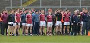 11 February 2017; The Slaughtneil squad with manager Mickey Moran, extreme left, stands for the anthem before the AIB GAA Football All-Ireland Senior Club Championship semi-final match between Slaughtneil and St Vincent's at Páirc Esler in Newry. Photo by Oliver McVeigh/Sportsfile