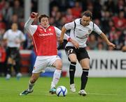 21 July 2011; Shane McFaul, St Patrick's Athletic, in action against Dusan Petronijevic, Karagandy. UEFA Europa League Second Qualifying Round, 2nd Leg, St Patrick's Athletic v Karagandy, Richmond Park, Inchicore, Dublin. Picture credit: Barry Cregg / SPORTSFILE