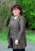 21 February 2002; Eithne Darragh stands for a portrait at her home in Rathnew, Wicklow. Photo by Damien Eagers/Sportsfile