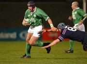 1 March 2002; Alan Quinlan of Ireland evades the tackle of Scotland's Graham Dill during the International 'A' match between Ireland and Scotland at Ravenhill Park, Belfast, Northern Ireland. Photo by Matt Browne/Sportsfile