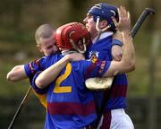 3 March 2002; UL players Timmy Houlihan, Brian O Mahony and John Devane celebrate following their side's victory during the Fitzgibbon Cup Final match between UL and WIT at Castlegar GAA in Galway. Photo by Sportsfile