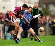 3 March 2002; Westmeath's Joe Fallon is challenged by Dublin's Coman Goggins during the Allianz National Football League Division 1A Round 4 match between Dublin and Westmeath at Parnell Park in Dublin. Photo by Ray McManus/Sportsfile