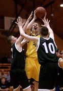 6 March 2002; Eoin White of Coláiste ƒanna in action against Conor Donaghy, left, and Kieran Donaghy of Tralee Community College during the Cadbury's Timeout All-Ireland Boys U19 'A' Final match between Coláiste ƒanna, Dublin, and Tralee Community College, Kerry, at ESB Arena in Tallaght, Dublin. Photo by Brendan Moran/Sportsfile