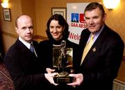 11 March 2002; Tyrone's Peter Canavan is presented with his Vodafone GAA All-Stars Player of the Month award for February by Deirdre McGreevy, centre, Customer Relations manager, Ulster and Connacht, Vodafone Ireland, and Uachtarán Chumann Lœthchleas Gael Sean McCague. Photo by Brendan Moran/Sportsfile