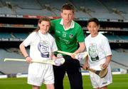 12 June 2013; At the launch of the Bus Éireann Féile final competitions are Limerick hurler Kevin Downes with Lauren Plummer and Josh Kantoh, both age 12. The two Féile final competitions will involve more than 4,000 boys and girls across the disciplines of Football, Hurling, Camogie, Ladies Football, and Handball as clubs from all over Ireland and a number of overseas units come together to compete for what are the GAA’s youngest national titles. Féile Peile na nÓg takes place in Co. Derry on the weekend of June 28th-30th while Limerick will host Féile na nGael between July 5th-7th. Croke Park, Dublin. Photo by Sportsfile