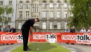 12 June 2013; To celebrate Newstalk’s official sponsorship of The Irish Open 2013, taking place from Thursday 27th to Sunday 30th June 2013 in Carton House, former Irish Open winner Shane Lowry took on Newstalk presenters in a unique putting challenge today in Dublin City Centre. South King Street, Dublin. Photo by Matt Browne/Sportsfile