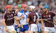 24 July 2011; John Mullane, Waterford, is surrounded by Galway players following an altercation, before being shown a yellow card by referee Cathal McAllister. GAA Hurling All-Ireland Senior Championship Quarter Final, Waterford v Galway, Semple Stadium, Thurles, Co. Tipperary. Picture credit: Diarmuid Greene / SPORTSFILE