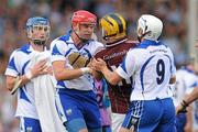 24 July 2011; Eoin Kelly, Waterford, and Ger Farragher, Galway, tussle off the ball during the first half. GAA Hurling All-Ireland Senior Championship Quarter Final, Waterford v Galway, Semple Stadium, Thurles, Co. Tipperary. Picture credit: Diarmuid Greene / SPORTSFILE