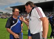 24 July 2011; Waterford manager Davy Fitzgerald, left, with Galway manager John McIntrye after the game. GAA Hurling All-Ireland Senior Championship Quarter Final, Waterford v Galway, Semple Stadium, Thurles, Co. Tipperary. Picture credit: Diarmuid Greene / SPORTSFILE