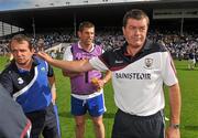 24 July 2011; Waterford manager Davy Fitzgerald, left, with Galway manager John McIntrye after the game. GAA Hurling All-Ireland Senior Championship Quarter Final, Waterford v Galway, Semple Stadium, Thurles, Co. Tipperary. Picture credit: Diarmuid Greene / SPORTSFILE