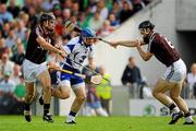 24 July 2011; Shane Walsh, Waterford, in action against Shane Kavanagh, left, and Tony îg Regan, Galway. GAA Hurling All-Ireland Senior Championship Quarter Final, Waterford v Galway, Semple Stadium, Thurles, Co. Tipperary. Picture credit: Dáire Brennan / SPORTSFILE