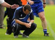 24 July 2011; Waterford officials rush in to congratulate manager Davy Fitzgerald after the final whistle, GAA Hurling All-Ireland Senior Championship Quarter Final, Waterford v Galway, Semple Stadium, Thurles, Co. Tipperary. Picture credit: Ray McManus / SPORTSFILE