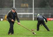 26 February 2017; Dan McCool removes surface water from McCumhaill Park, Ballybofey, before the Allianz Football League Division 1 Round 3 match between Donegal and Dublin at MacCumhaill Park in Ballybofey, Co Donegal. Photo by Stephen McCarthy/Sportsfile