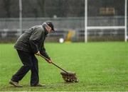 26 February 2017; Dan McCool removes surface water from McCumhaill Park, Ballybofey, before the Allianz Football League Division 1 Round 3 match between Donegal and Dublin at MacCumhaill Park in Ballybofey, Co Donegal. Photo by Stephen McCarthy/Sportsfile