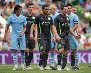 30 July 2011; Airtricity League players Shane McEleney, Eamon Zayed and Barry Molloy line up to defend a free kick. Dublin Super Cup, Airtricity League XI v Manchester City, Aviva Stadium, Lansdowne Road, Dublin. Picture credit: Brendan Moran / SPORTSFILE