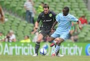 30 July 2011; Shaun Wright-Phillips, Manchester City, in action against Barry Molloy, Airtricity League XI. Dublin Super Cup, Airtricity League XI v Manchester City, Aviva Stadium, Lansdowne Road, Dublin. Picture credit: Brendan Moran / SPORTSFILE