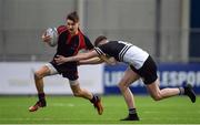 1 March 2017; Jamie Metchette of Wesley College is tackled by Marcus Kiely of Newbridge College during the Bank of Ireland Leinster Schools Junior Cup Second Round match between Wesley College and Newbridge College at Donnybrook Stadium in Donnybrook, Dublin. Photo by David Fitzgerald/Sportsfile