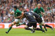 6 August 2011; Niall Ronan, Ireland, supported by captain Leo Cullen, is tackled by Jim Hamilton, 4, and Alastair Strokosch, Scotland. Rugby World Cup Warm-up Game, Scotland v Ireland, Murrayfield Stadium, Edinburgh, Scotland. Picture credit: Brendan Moran / SPORTSFILE