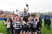 4 March 2017; Wanderers captain Anne Grumelard celebrates with the trophy following the Leinster Women’s Day Division 4 Playoffs match between Wanderers and Dublin University at St. Michael's College in Ailesbury Road, Dublin. Photo by David Fitzgerald/Sportsfile