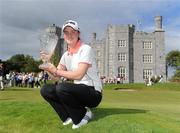 7 August 2011; Leona Maguire, Ireland, on the 18th green with her trophy after finishing as the leading amateur  at the Ladies Irish Open Golf Championship. Killeen Castle, Dunsany, Co. Meath. Picture credit: Matt Browne / SPORTSFILE