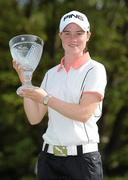 7 August 2011; Leona Maguire, Ireland, on the 18th green with her trophy after finishing as the leading amateur at the Ladies Irish Open Golf Championship. Killeen Castle, Dunsany, Co. Meath. Picture credit: Matt Browne / SPORTSFILE