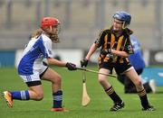 7 August 2011; Avril Deegan, right, from Scoil Tighearnach N.S., Portlaoise, Co. Laois, representing Kilkenny, in action against Orlaith Murphy, Scoil Mhuire GNS, Lucan, Co. Dublin, representing Waterford. Go Games Exhibition - Sunday 7th August 2011. Croke Park, Dublin. Picture credit: Daire Brennan / SPORTSFILE