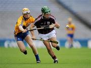 7 August 2011; Cormac Diviney, Galway, in action against Aaron Cunningham, Clare. GAA Hurling All-Ireland Minor Championship Semi-Final, Clare v Galway, Croke Park, Dublin. Picture credit: Ray McManus / SPORTSFILE