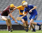 7 August 2011; The Clare goalkeeper Eibhear Quilligan, right, and full back Jack Browne, in action against Jack Carr, Galway. GAA Hurling All-Ireland Minor Championship Semi-Final, Clare v Galway, Croke Park, Dublin. Picture credit: Ray McManus / SPORTSFILE
