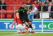 9 August 2011; Robbie Brady, Republic of Ireland, is fouled by Michael Solbauer, Austria, resulting in a penalty. U21 International Friendly, Republic of Ireland v Austria, The Showgrounds, Sligo. Picture credit: Stephen McCarthy / SPORTSFILE