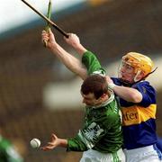 10 March 2002; Sean O'Connor of Limerick in action against Paul Ormonde of Tipperary during the Allianz National Hurling League Division 1B Round 2 match between Tipperary and Limerick at Semple Stadium in Thures, Tipperary. Photo by Ray McManus/Sportsfile