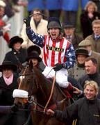 13 March 2002; Richard Johnson celebrates winning the Queen Mother Champion Steeple Chase on Flagship Uberalles during Day Two of the Cheltenham Racing Festival at Prestbury Park in Cheltenham, England. Photo by Matt Browne/Sportsfile