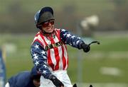 13 March 2002; Richard Johnston celebrates after winning The Queen Mother Champion Steeplechase on Flagship Uberalles during Day Two of the Cheltenham Racing Festival at Prestbury Park in Cheltenham, England. Photo by Matt Browne/Sportsfile