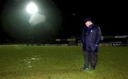 15 March 2002; St Patricks Athletic manager Pat Dolan inspects the pitch in Oriel Park after the game was postponed during the Eircom League Premier Division match between Dundalk and St Patricks Athletic at Oriel Park in Dundalk, Louth. Photo by David Maher/Sportsfile