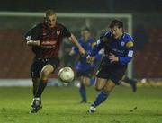 15 March 2002; Dave Morrison of Bohemians in action against  Wesley Burn of Longford Town during the Eircom League Premier Division match between Bohemians and Longford Town at Dalymount Park in Dublin. Photo by Ray McManus/Sportsfile