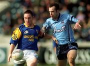 16 March 2002; John Kiernan of Longford in action against Conor Murphy of Dublin during the Leinster u21 Football Championship quarter final match between Dublin and Longford at Parnell Park in Dublin. Photo by Brian Lawless/Sportsfile