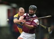 18 March 2002; Liam Hodgins of Galway in action against Ollie Baker of Clare during the Allianz National Hurling League Division 1A Round 3 match between Galway and Clare at Duggan Park in Ballinasloe, Galway. Photo by Ray McManus/Sportsfile