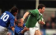 23 March 2002; Gordon D'Arcy of Ireland is tackled by Juan Sebastien Francesio and Francesco Mazzario of Italy during the Six Nations Rugby Championship match between Ireland and Italy at Lansdowne Road in Dublin. Photo by Matt Browne/Sportsfile