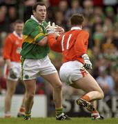 24 March 2002; Seamus Moynihan of Kerry in action against John McEntee of Armagh during the Allianz National Football League Division 2A Round 6 match between Kerry and Armagh at Austin Stack Park in Tralee, Kerry. Photo by Brendan Moran/Sportsfile