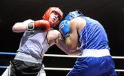 10 August 2011; Paddy Gallagher, Gleann, left, exchanges punches with John Joe Joyce, St. Michaels Athy, during their 69kg bout. IABA Senior Open Elite Competition 2011, National Stadium, Dublin. Picture credit: Barry Cregg / SPORTSFILE