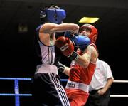 11 August 2011; Shane Cox, Gorey, right, exchanges punches with Tyrone McCullouigh, Holy Family GG, during their 56kg Quarter-Final bout. IABA Senior Open Elite Competition 2011, National Stadium, Dublin. Picture credit: Brian Lawless / SPORTSFILE