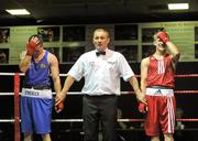 12 August 2011; Referee Paul McMahon with David Oliver Joyce, St. Michaels Athy, left, and Eric Donovan, St. Michaels Athy, as they await the result of a count back after the fight ended in a 16 - 16 draw. Joyce was subsequently awarded the fight. IABA Senior Open Elite Competition 2011, National Stadium, Dublin. Picture credit: Brian Lawless / SPORTSFILE