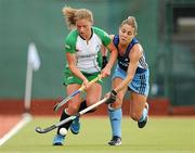 12 August 2011; Chloe Watkins, Ireland, in action against Ana Rodriguez Perez, Argentina. Women's Hockey International, Ireland v Argentina, National Hockey Stadium, UCD, Belfield, Dublin. Picture credit: Stephen McCarthy / SPORTSFILE