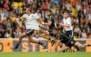 12 August 2011; Simon Zebo, Munster, is tackled by Romain Sazy, La Rochelle. Pre-Season Friendly, La Rochelle v Munster, Stade Marcel-Deflandre, La Rochelle, France. Picture credit: Brendan Moran / SPORTSFILE