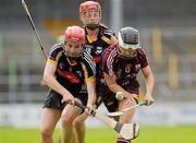 13 August 2011; Tara Ruttledge, Galway, in action against Aisling Dunphy, left, and Grace Walsh, centre, Kilkenny. All-Ireland Senior Camogie Championship Semi-Final in association with RTE Sport, Kilkenny v Galway, Nowlan Park, Kilkenny. Picture credit: Pat Murphy / SPORTSFILE