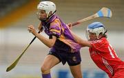 13 August 2011; Mags D'Arcy, Wexford, in action against Jennifer O'Leary, Cork. All-Ireland Senior Camogie Championship Semi-Final in association with RTE Sport, Cork v Wexford, Nowlan Park, Kilkenny. Picture credit: Pat Murphy / SPORTSFILE